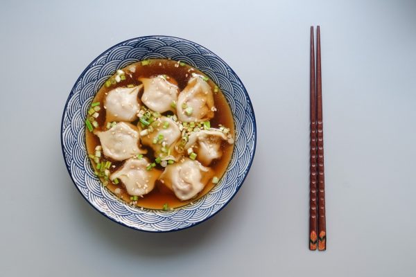 round-white-and-blue-ceramic-bowl-with-cooked-ball-soup-and-955137.jpg